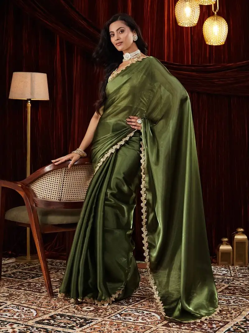 Organza green sequinned embellished saree