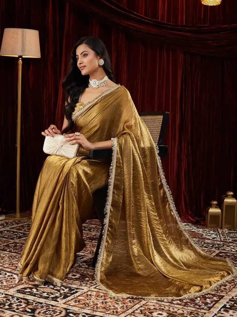 Tissue gold sequinned embellished saree