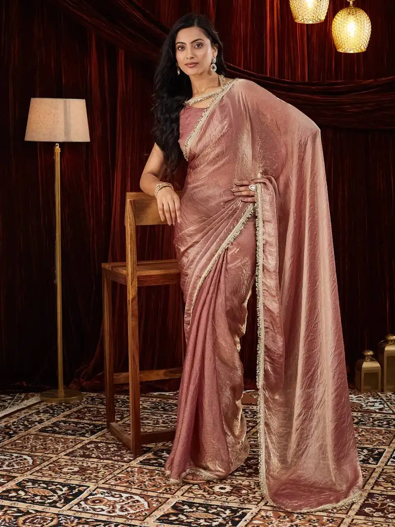 Tissue mauve sequinned embellished saree