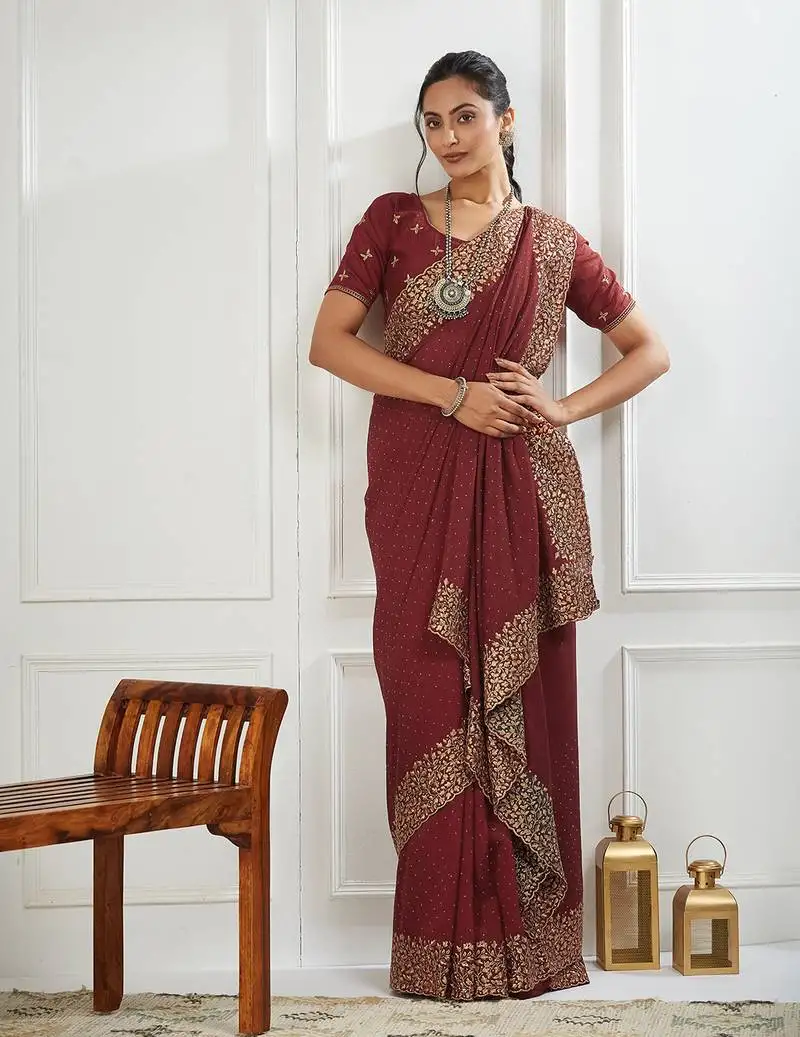Maroon embroidered silk blend saree