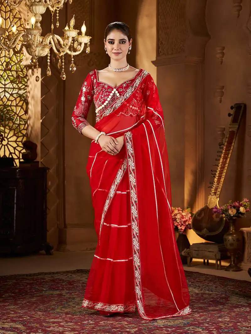 Red net embroidery work saree with unstitched blouse piece