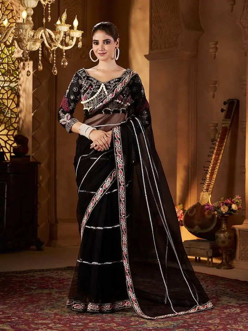 Black net embroidery work saree with unstitched blouse piece