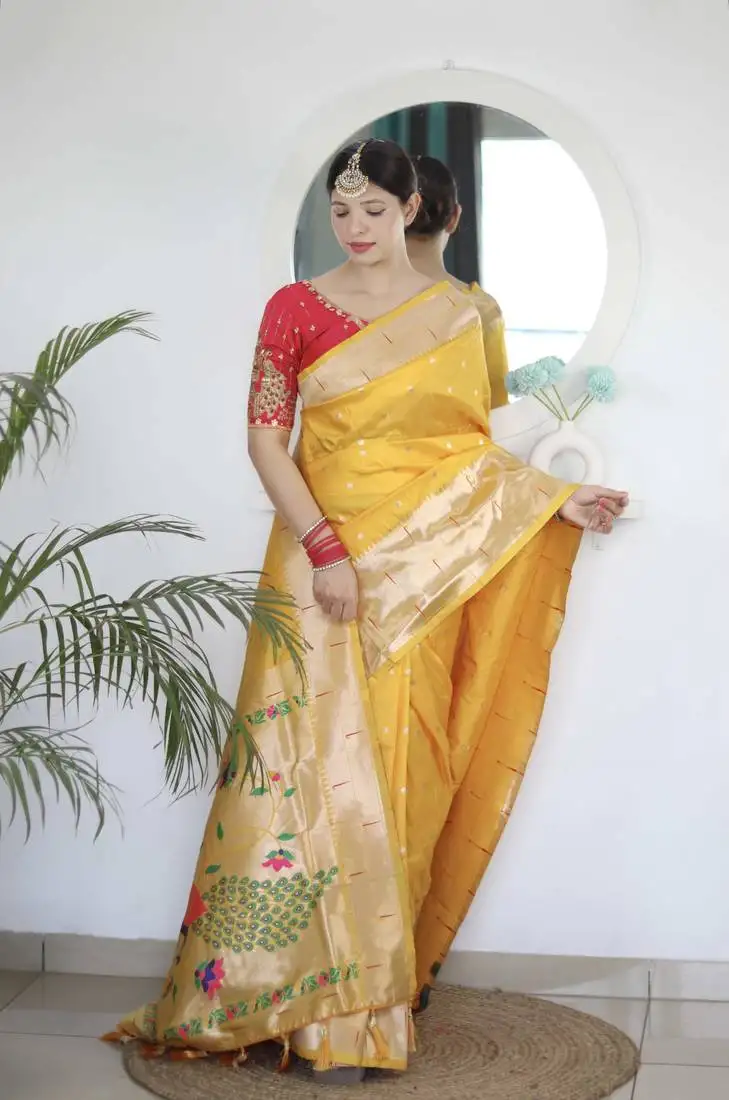 Yellow paithani silk blend saree with unstitched blouse