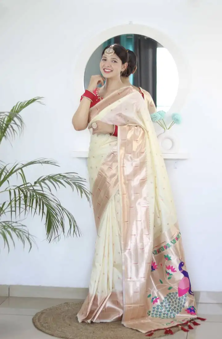 White paithani silk blend saree with unstitched blouse