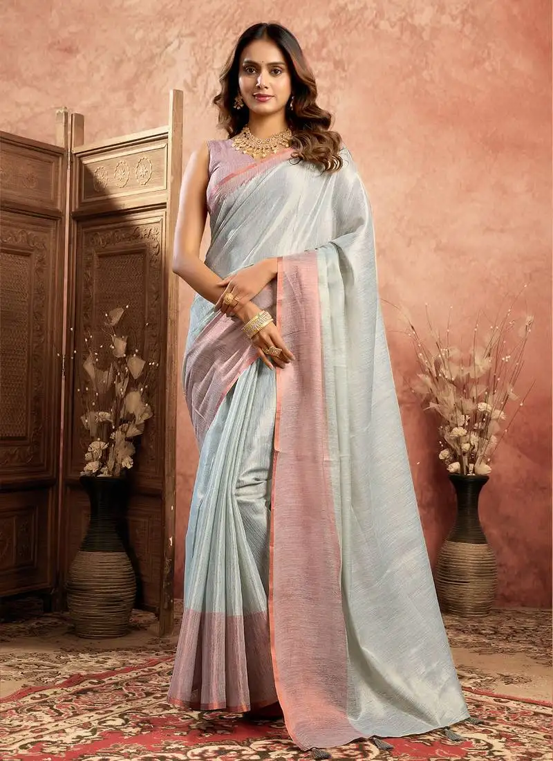 Sky blue tissue silk saree with weave border and blouse