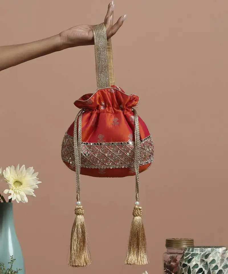 Orange pure silk brocade potli bag