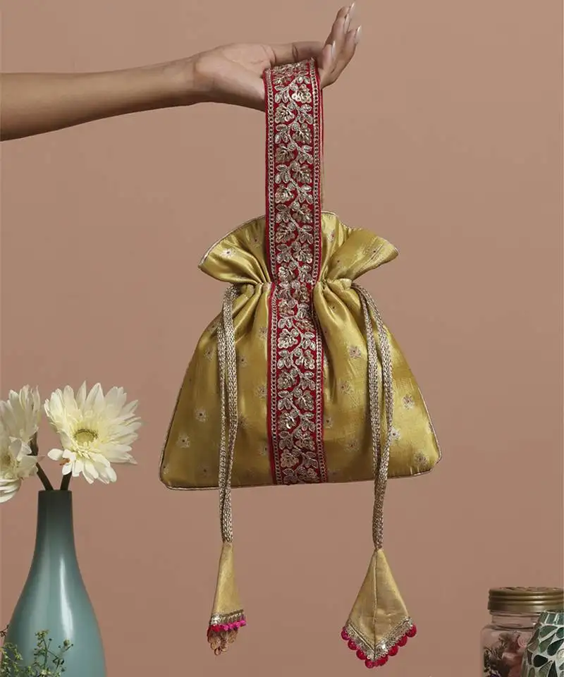 Magenta and pista pure silk potli bag
