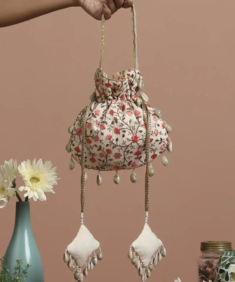Cream and peach floral potli bag