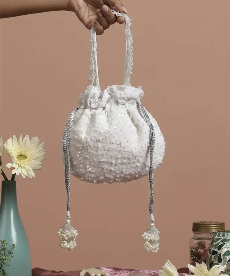 White georgette with sequin potli bag