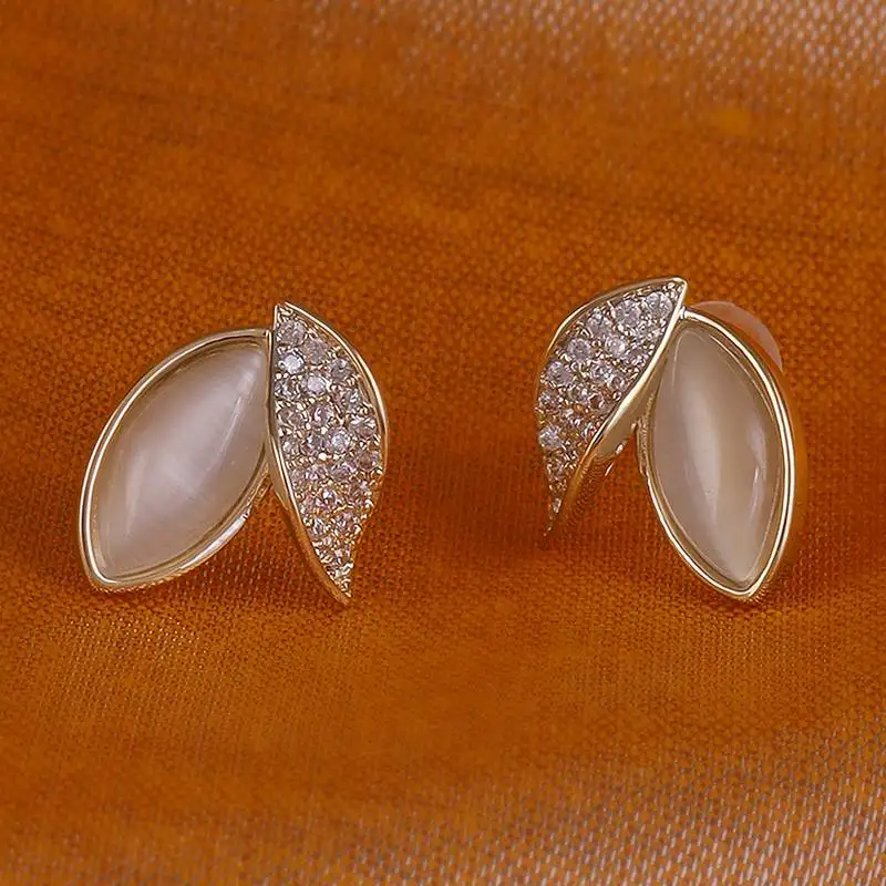 Eye-catchy cat eye stone leaf gold plated stud earring for women and girls