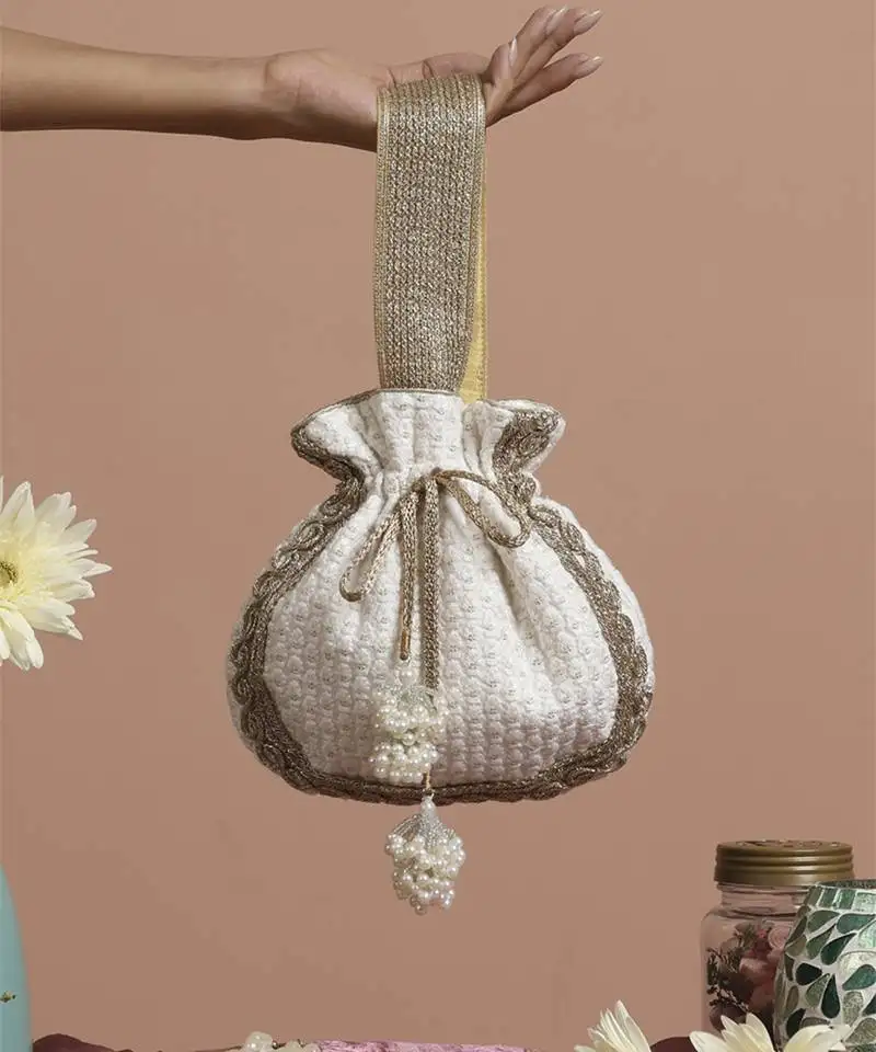 White with gold sequin potli bag