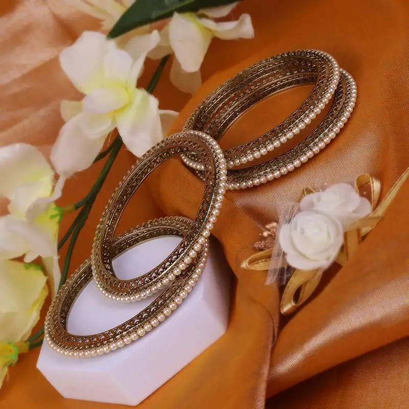 Glimmery pearl antique gold plated set of 4 bangles for women and girls