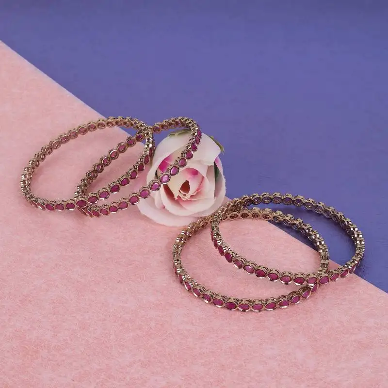 Desirable oval pink crystal antique gold plated set of 4 bangles for women and girls