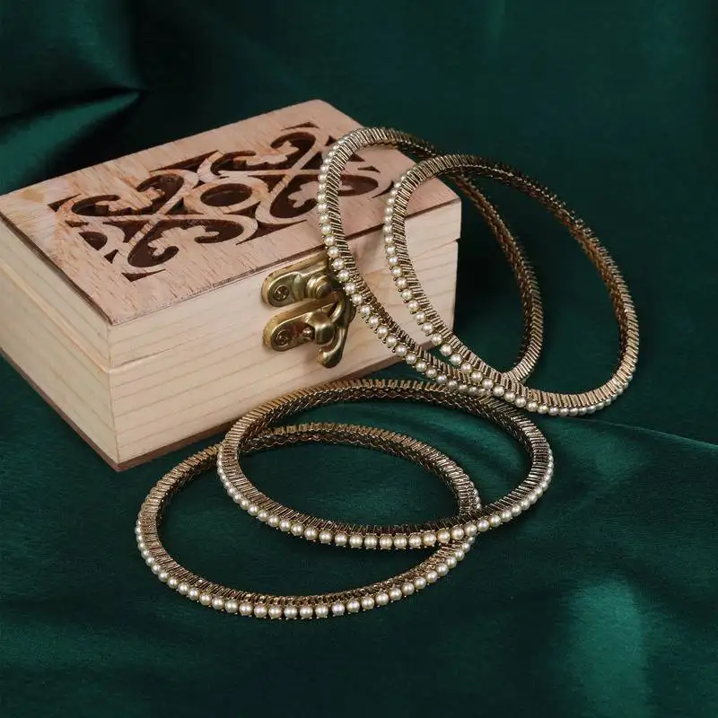 Classy pearl antique gold plated set of 4 bangles for women and girls