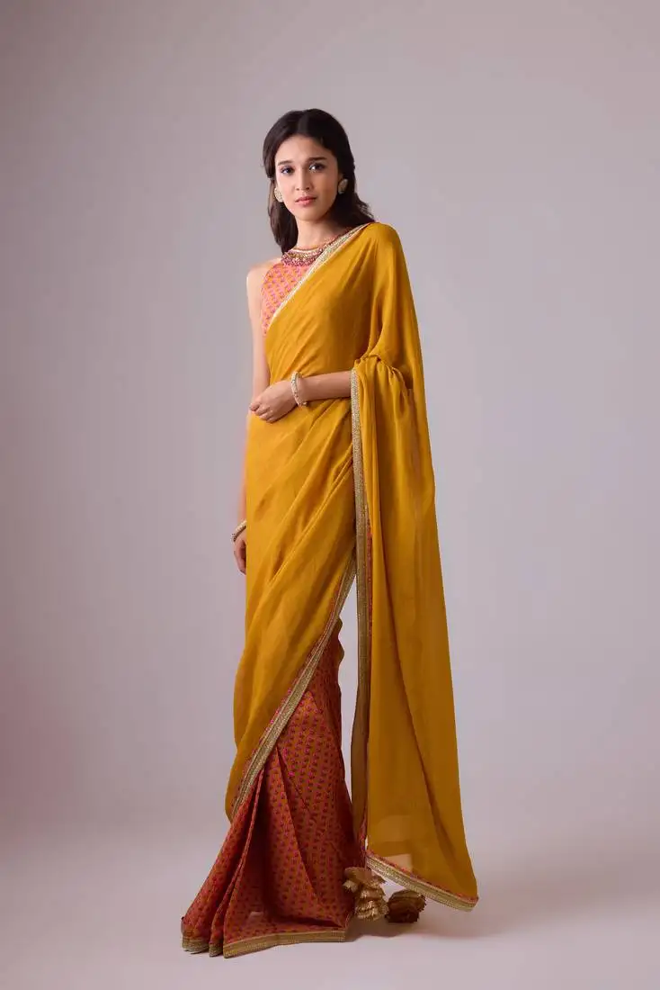 Yellow plain georgette saree with embroidered blouse