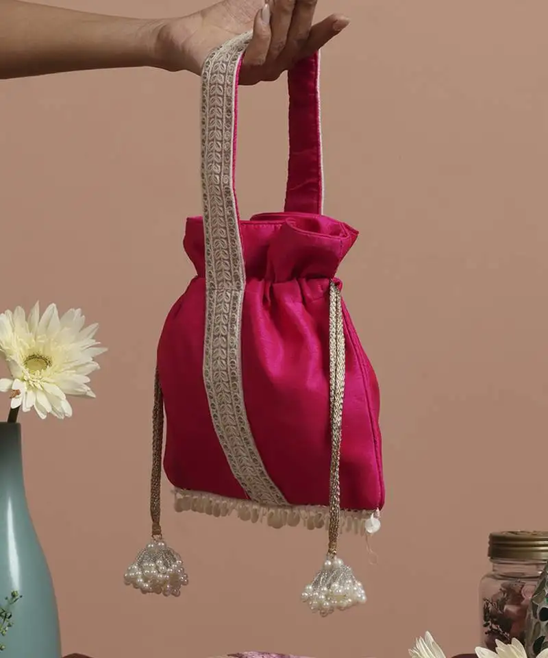 Magenta and white silk potli bag