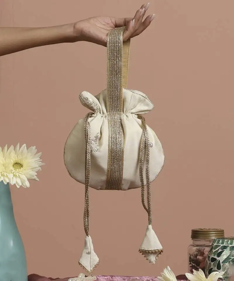 Cream and gold buti silk potli bag