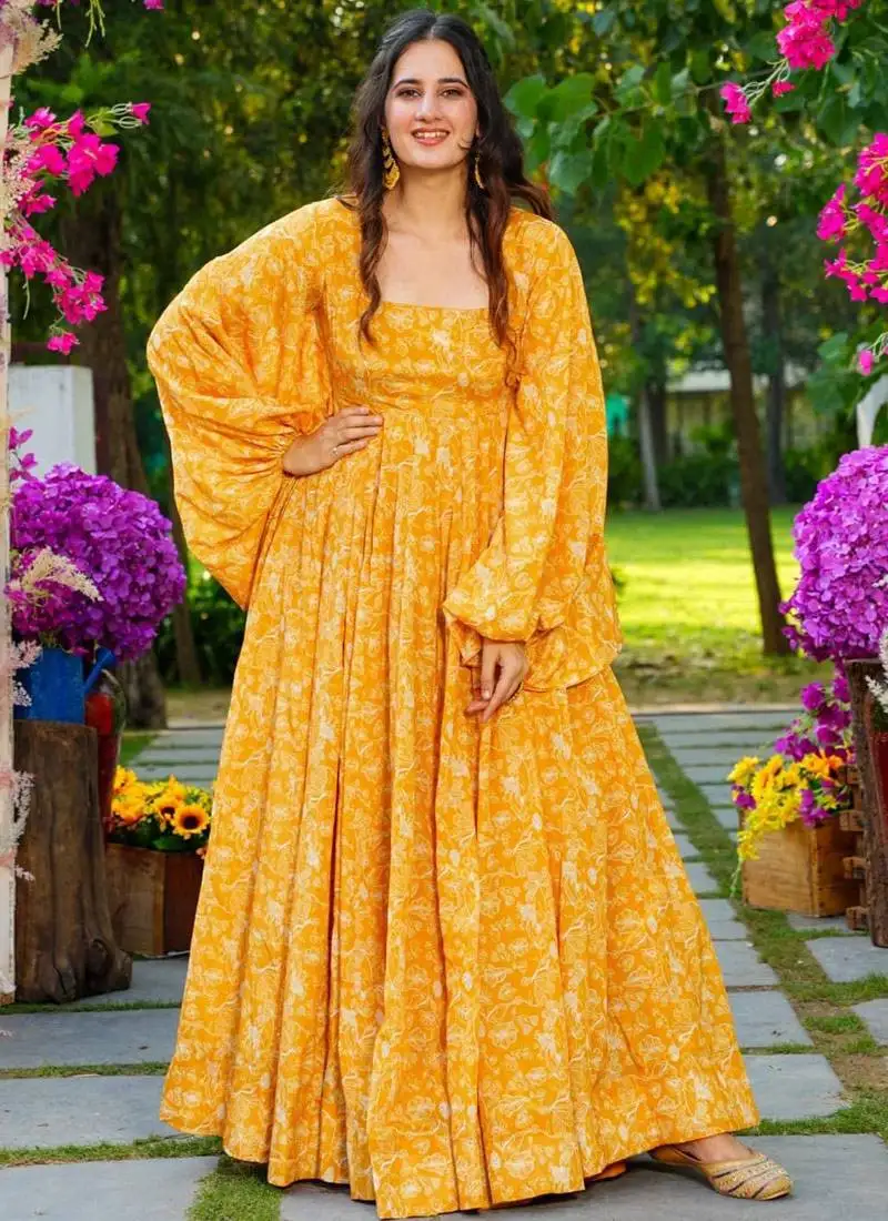 Yellow printed georgette gown stitched
