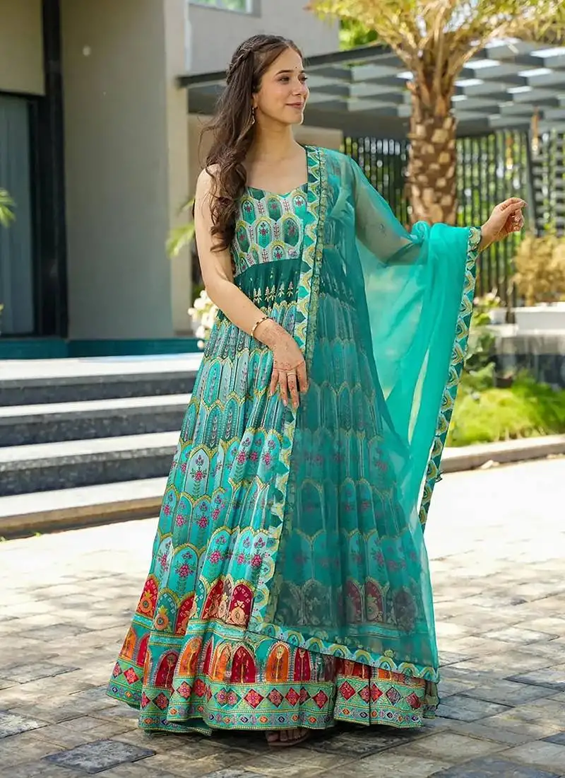 Sky blue printed silk gown stitched