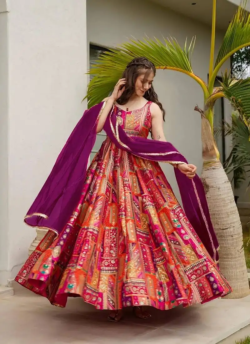 Pink printed jharna silk gown stitched
