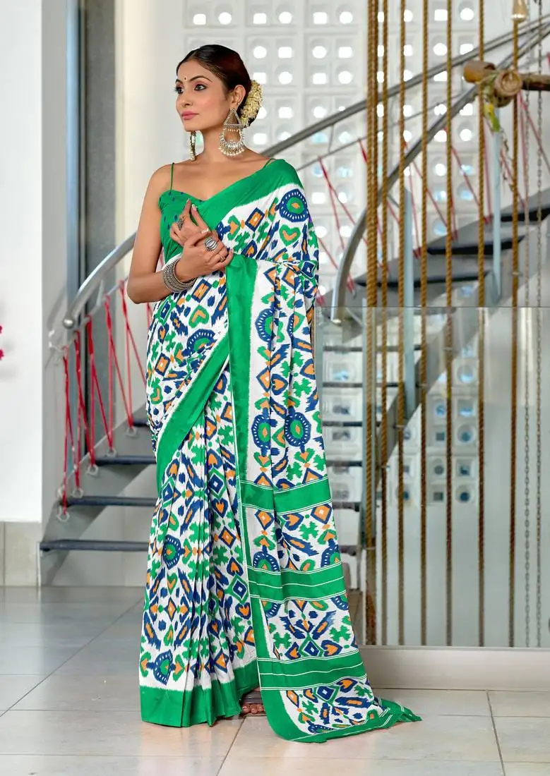 Teal mulcotton ikat block print saree with unstitched blouse piece