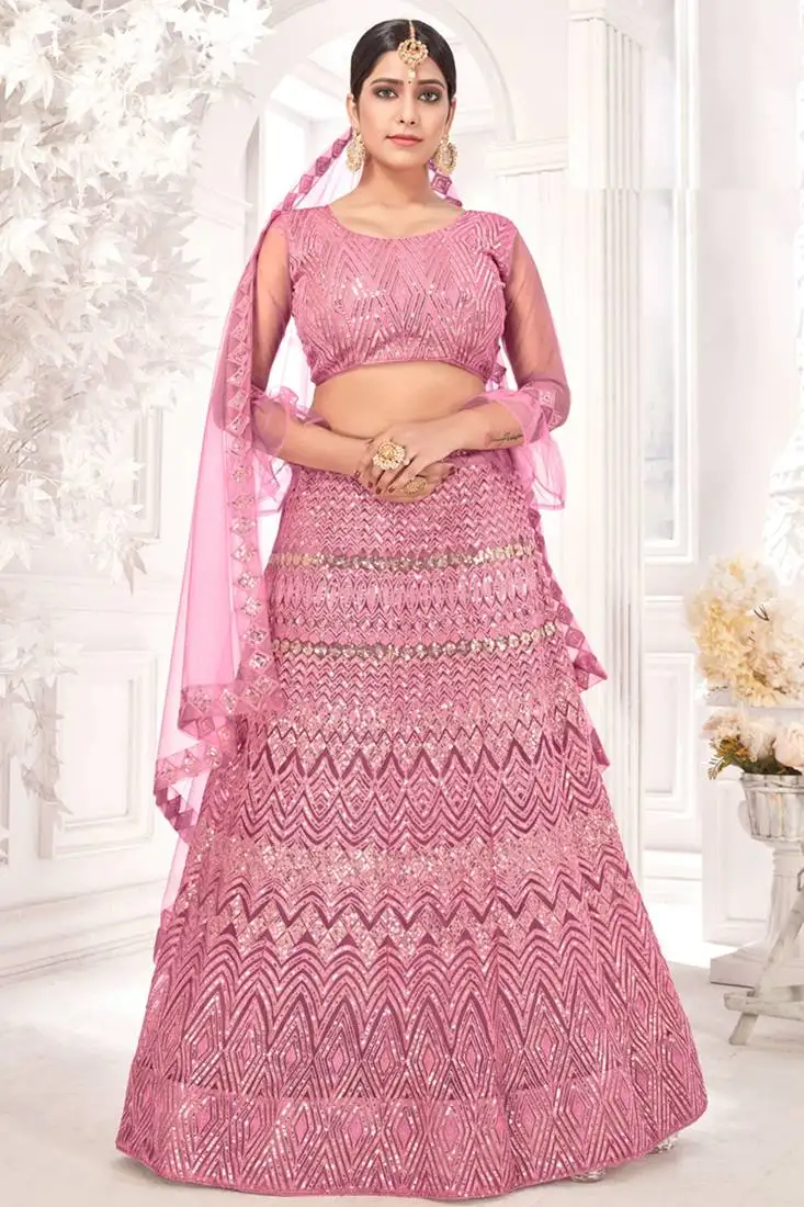 Pink embroidered sequins work net lehenga choli