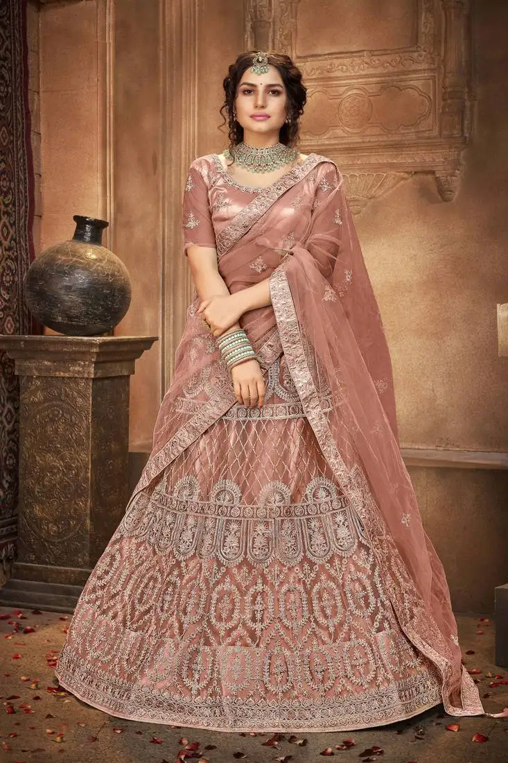 Peach embroidered stone work net semi stitched lehenga choli