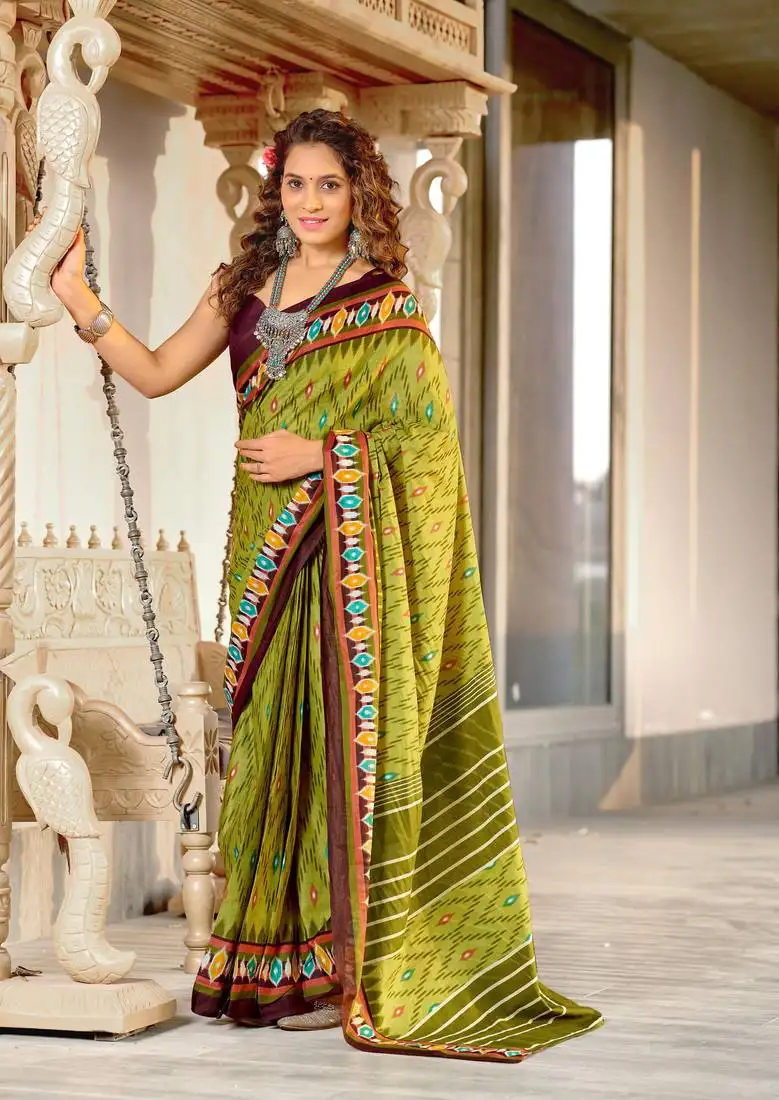 Green mulcotton ikat print saree with unstitched blouse piece