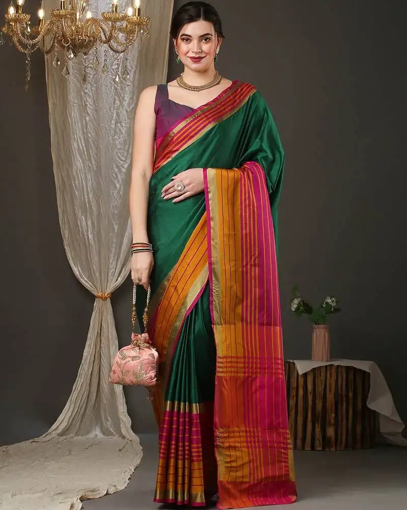 Dark green border silk blend saree with contrast blouse