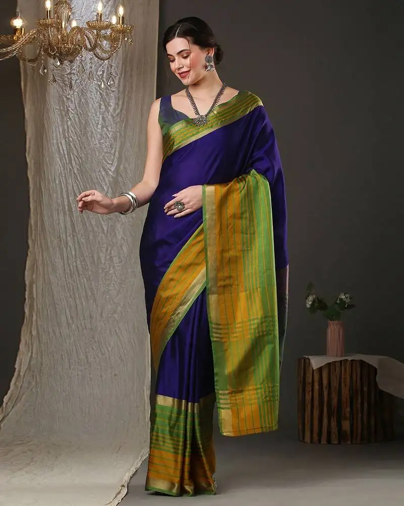 Blue border silk blend saree with contrast blouse