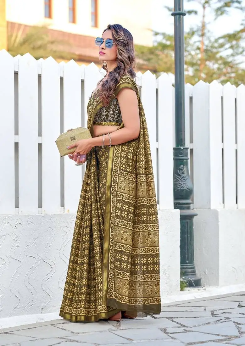 Green mulmul cotton printed zari border saree with unstitched printed blouse piece