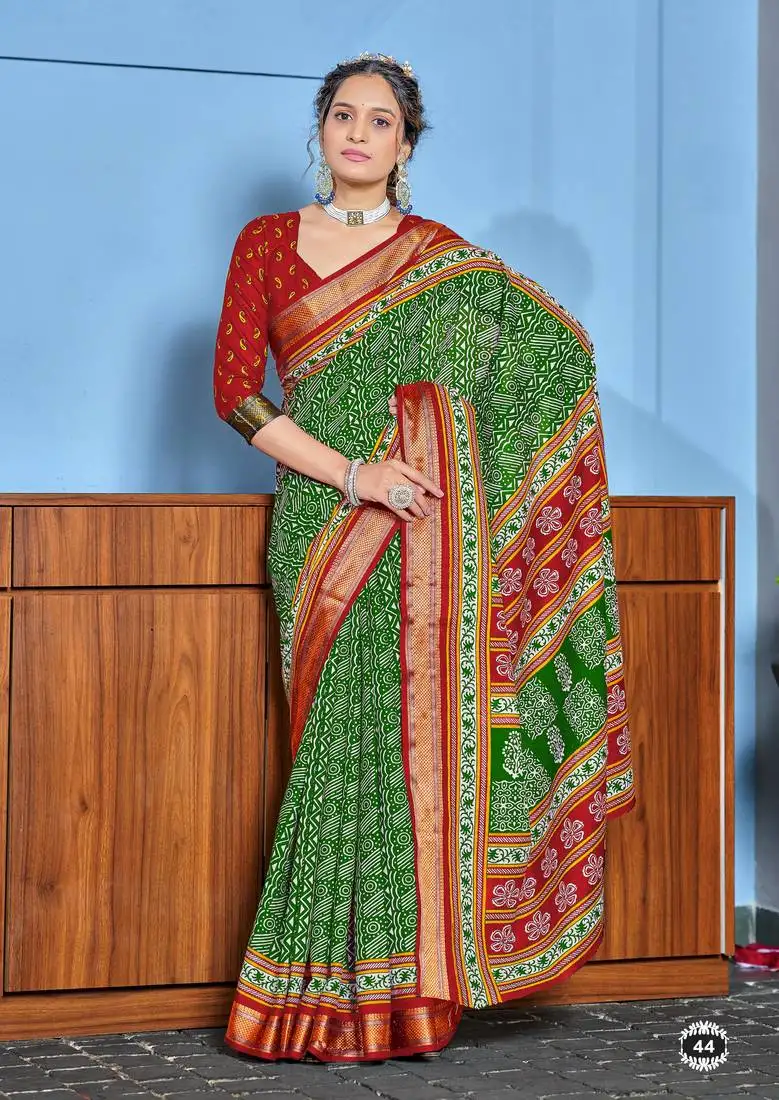 Green cotton ajrakh print saree with contrast blouse piece