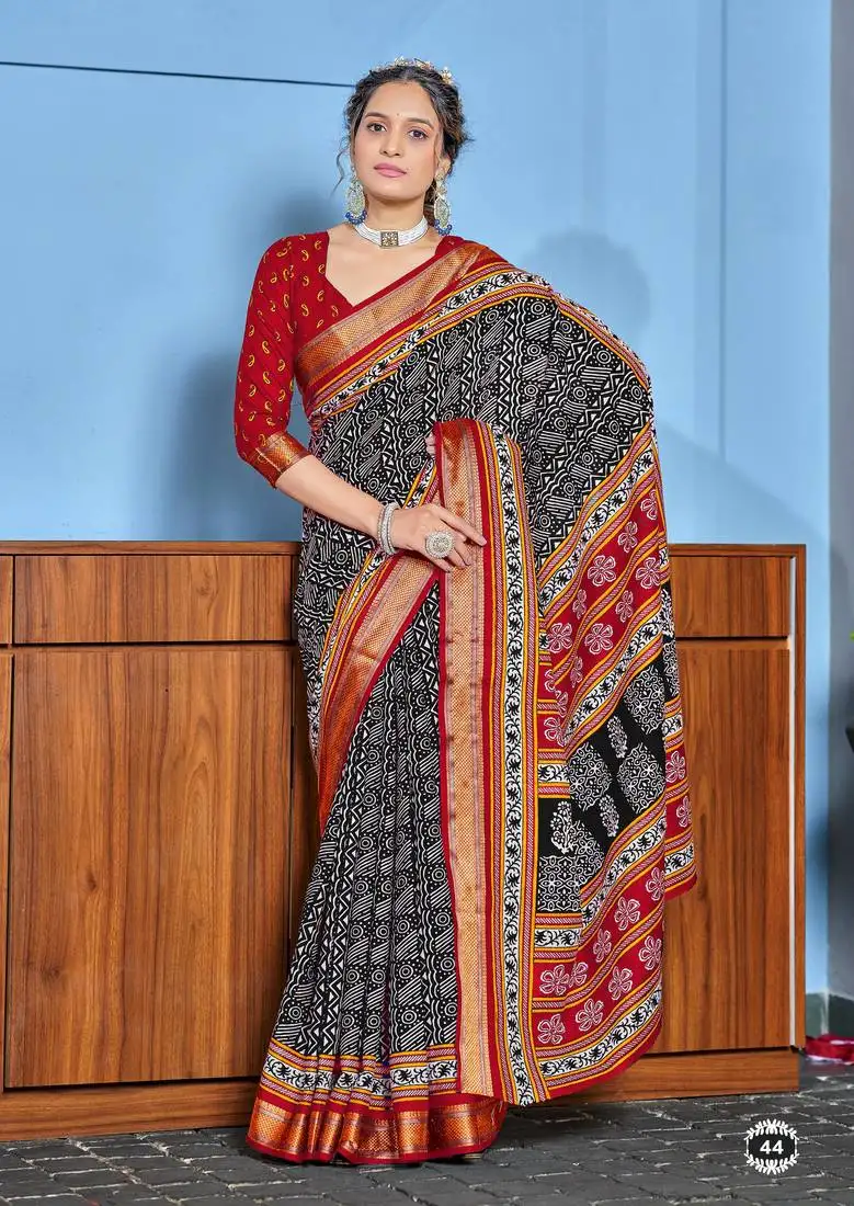 Black cotton ajrakh print saree with contrast blouse piece