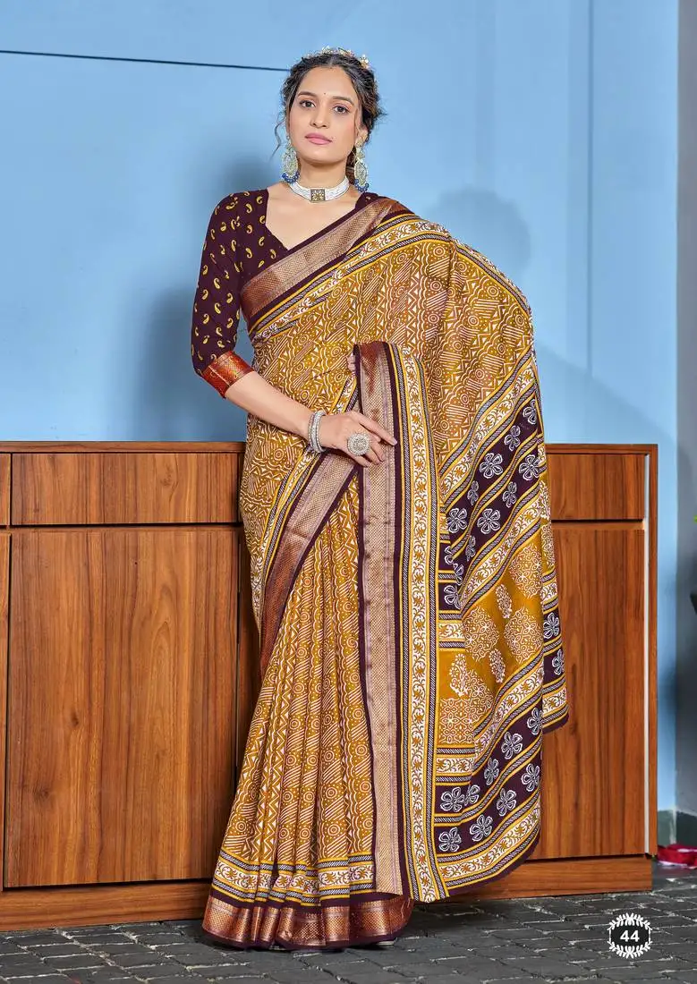 Mustard cotton ajrakh print saree with contrast blouse piece