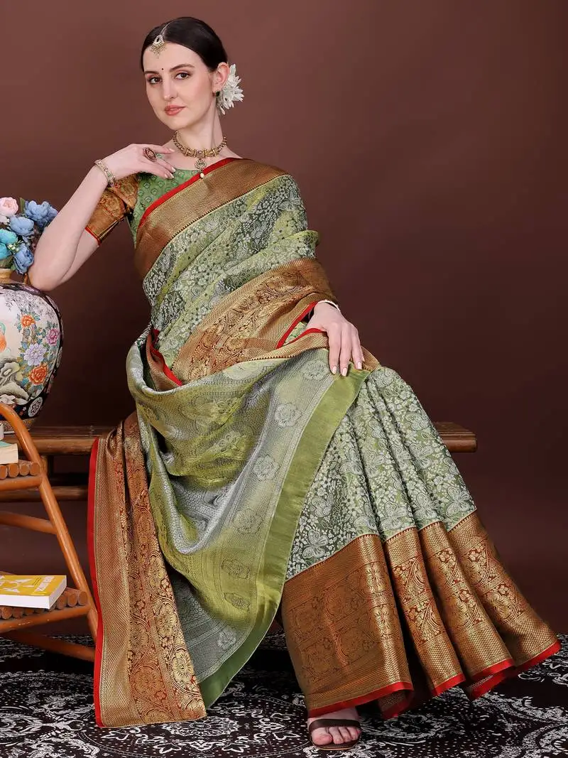 Dark green zari woven silk blend saree