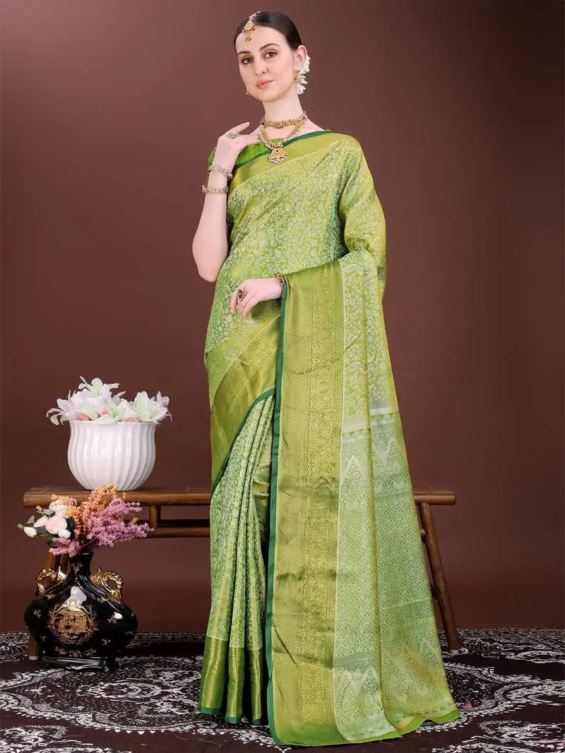 Mint green zari woven silk blend saree