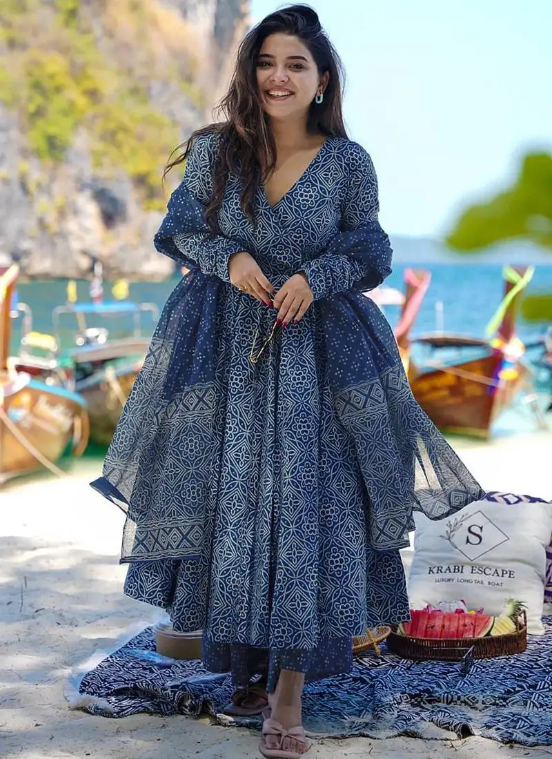 Teal blue printed muslin palazzo suits stitched