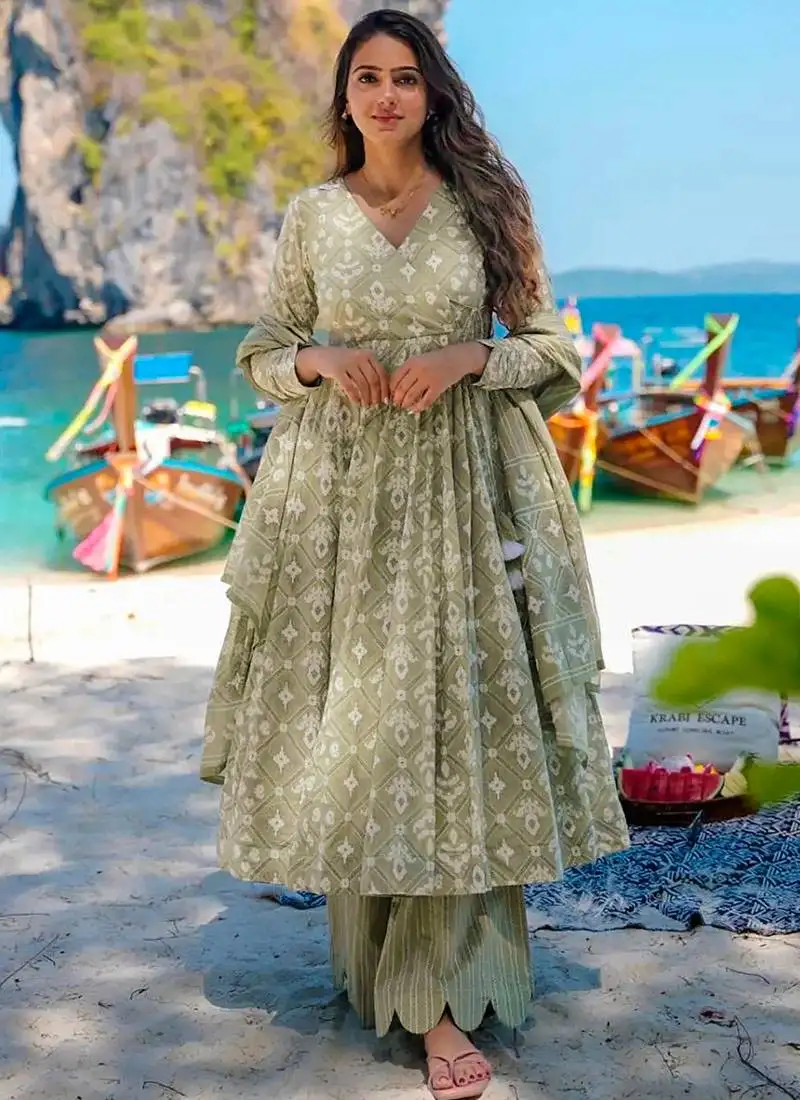 Light olive green printed muslin palazzo suits stitched