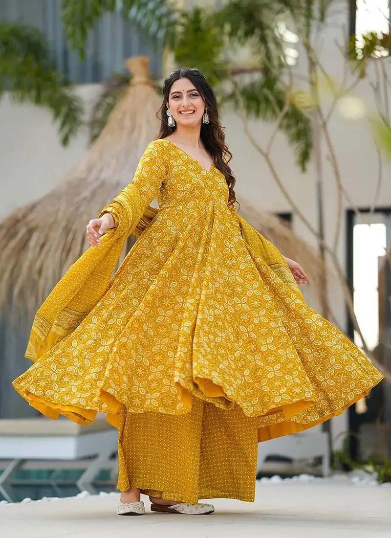 Yellow printed muslin palazzo suit stitched