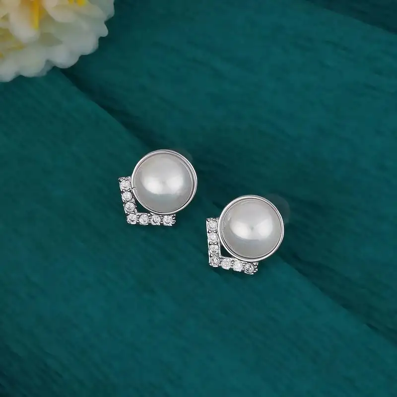 Attractive round mother pearl silver plated stud earring for women and girls