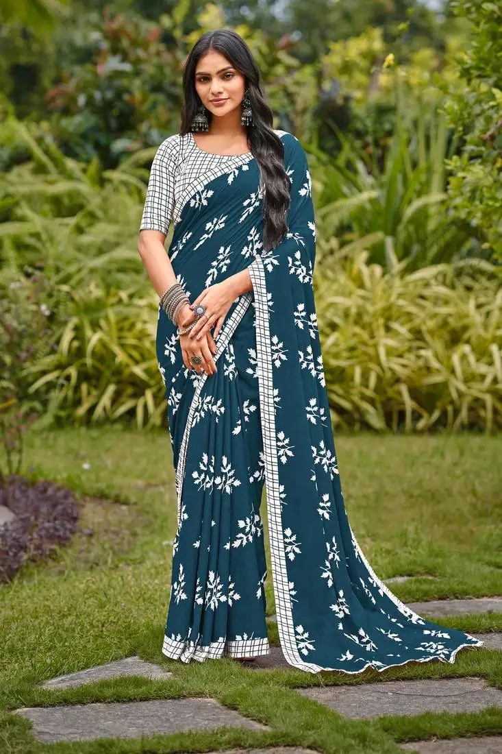 Blue cotton floral print saree with printed blouse piece