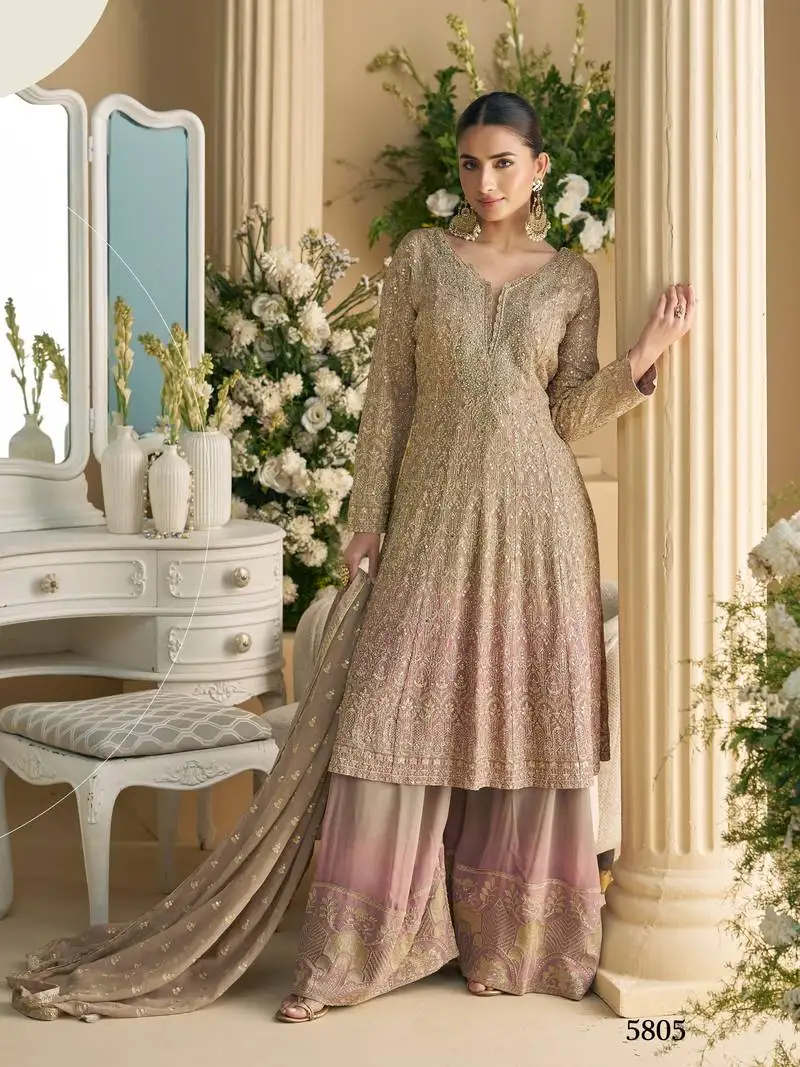 Light pink heavy embroidery dola silk suits stitched