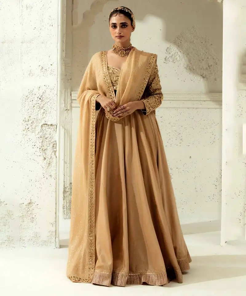 Plain gold silk blend lehenga with embroidered dupatta