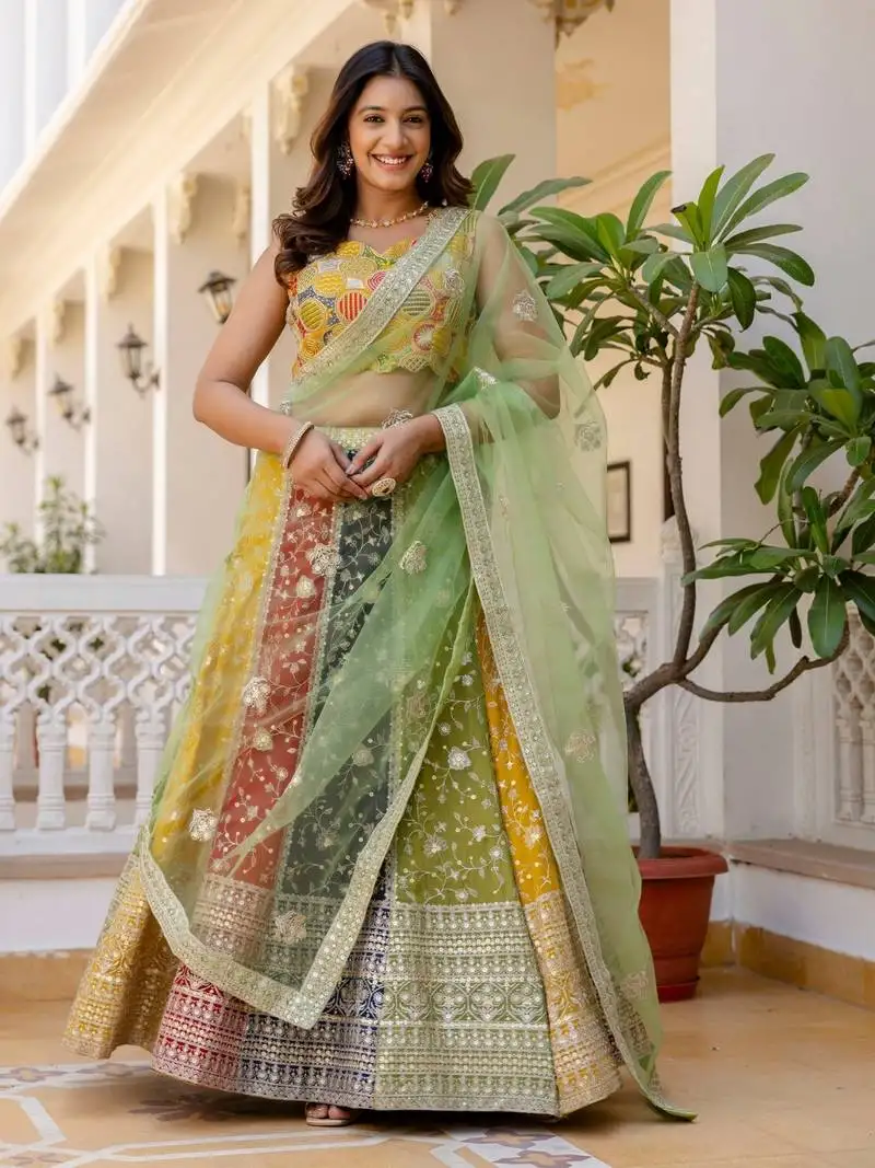Multicolor embroidered georgette lehenga choli with green net dupatta