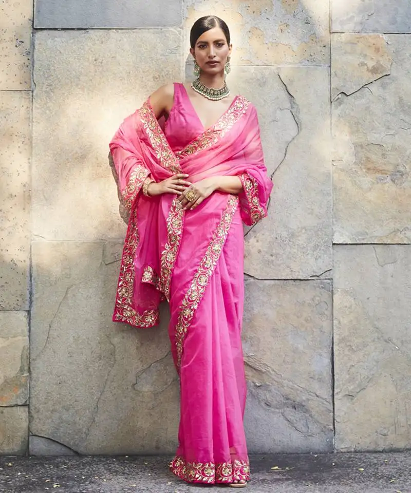 Fuschia pink silk zari woven embroidered saree
