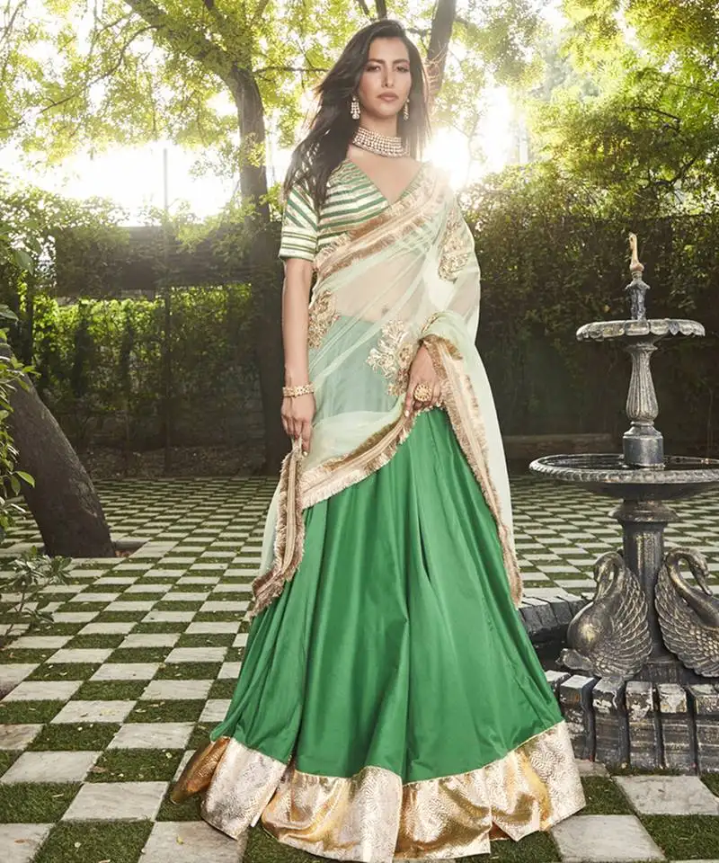 Green silk plain lehenga with gota border