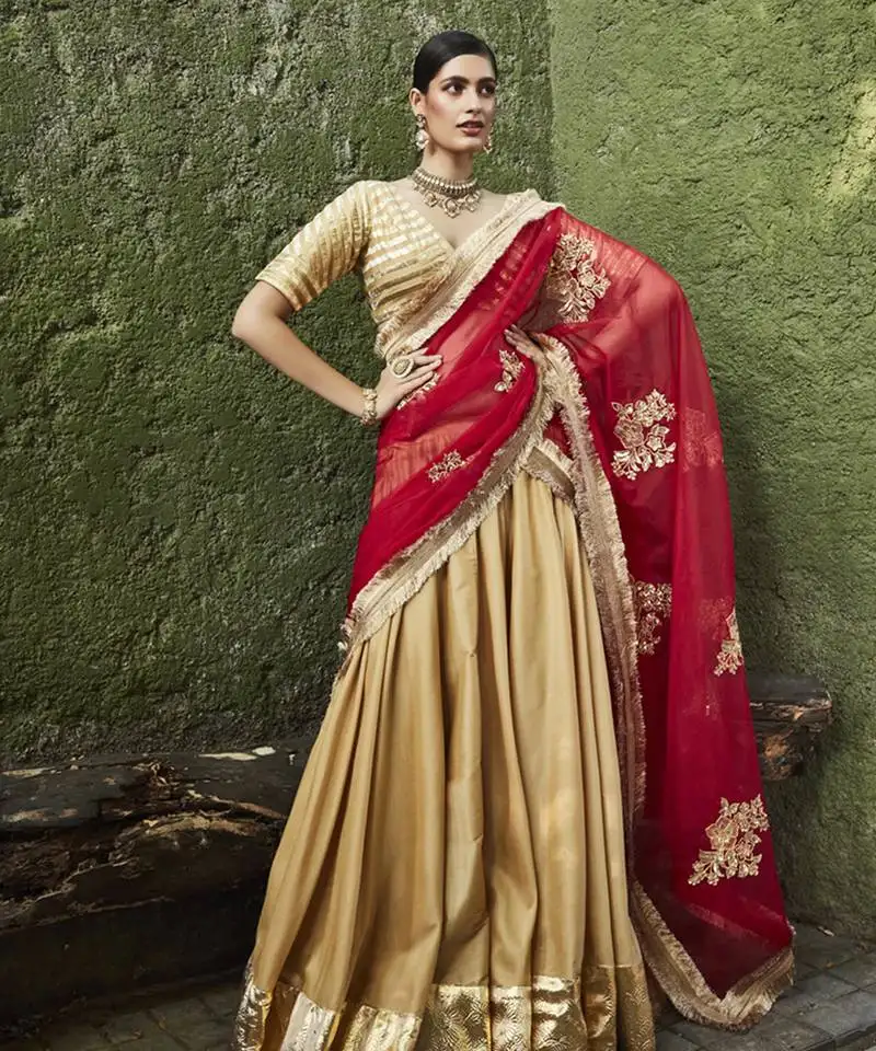 Gold silk plain lehenga with gota border