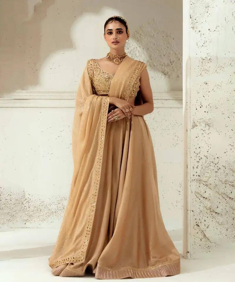 Gold silk blend plain lehenga with embroidered dupatta