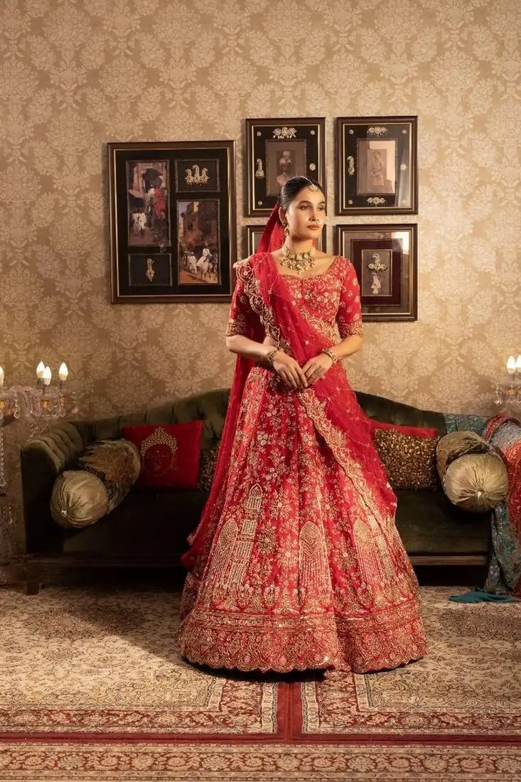 Red silk bridal lehenga cutdana embellishments