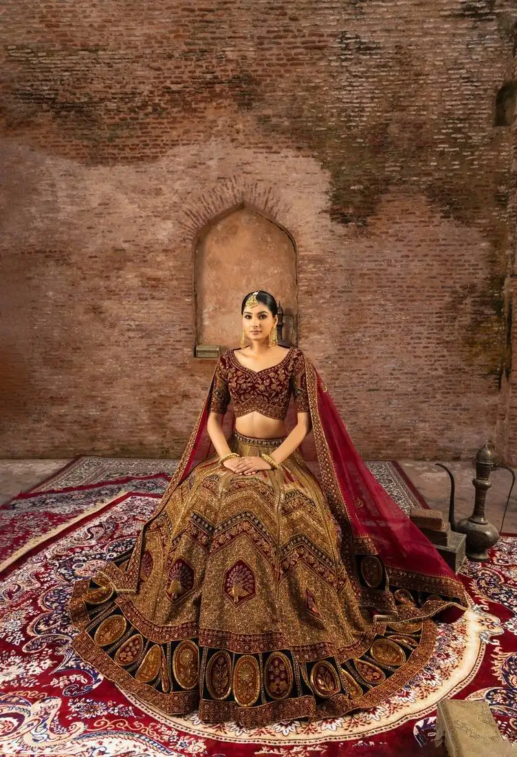 Maroon silk bridal lehenga with zardozi embroidery